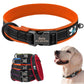 Reflective personalized dog collar on a white background.